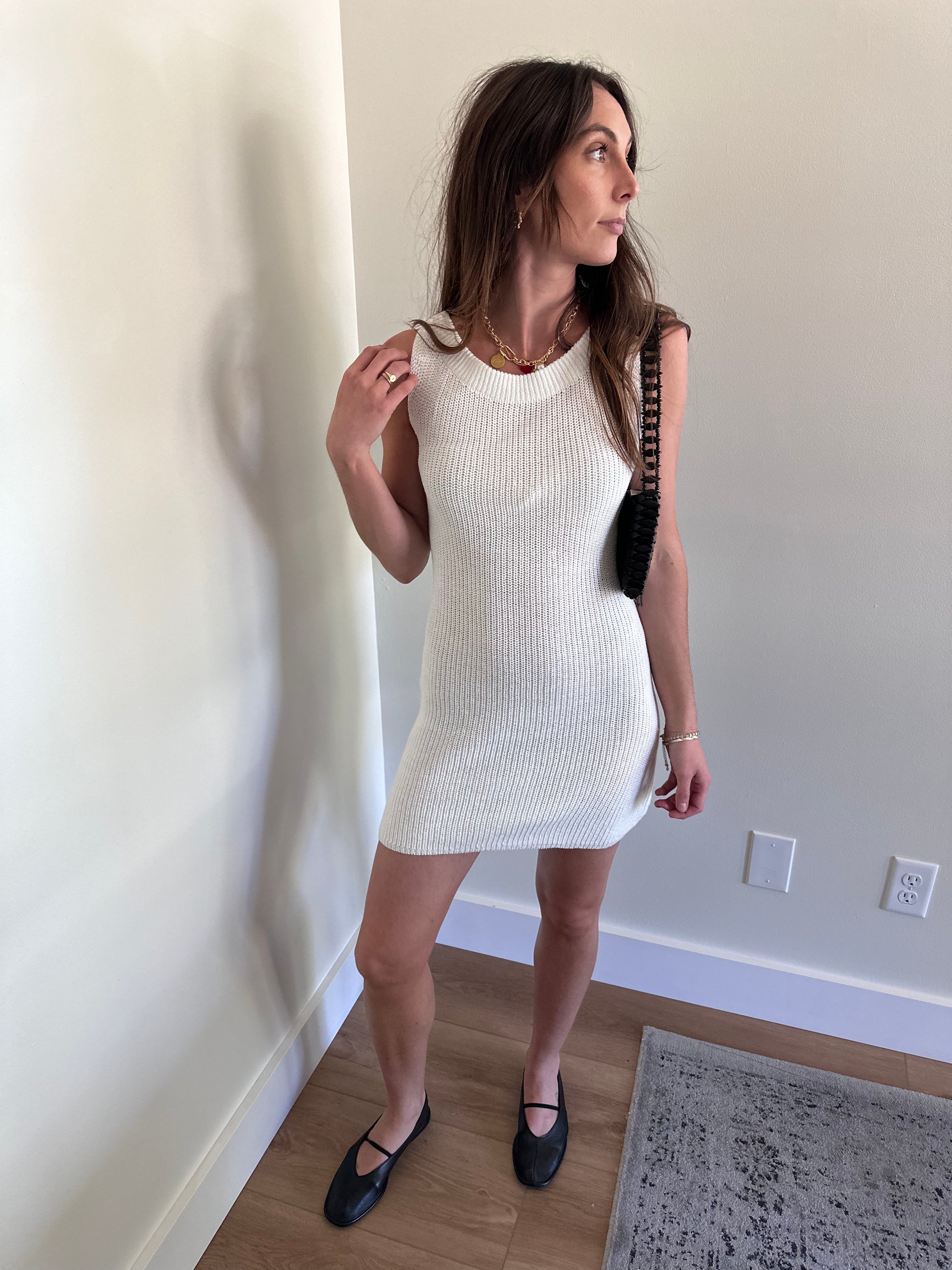 Girl wearing white knit mini dress for women